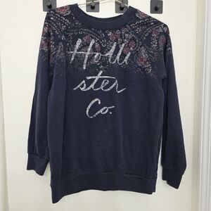 Hollister Dark Blue Sweatshirt with Floral Design